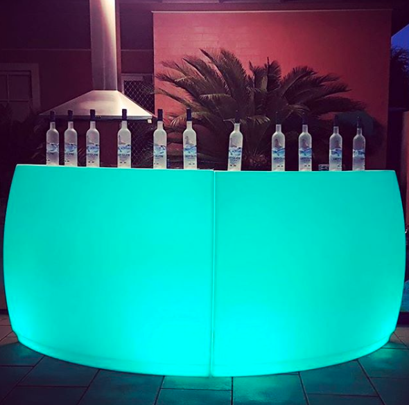 glow curved bar at an evening function