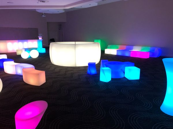 glow themed event with glow bars, glow cubes and benches