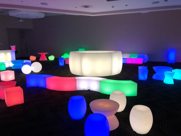 glow themed event with glow bars, benches and bongo seats