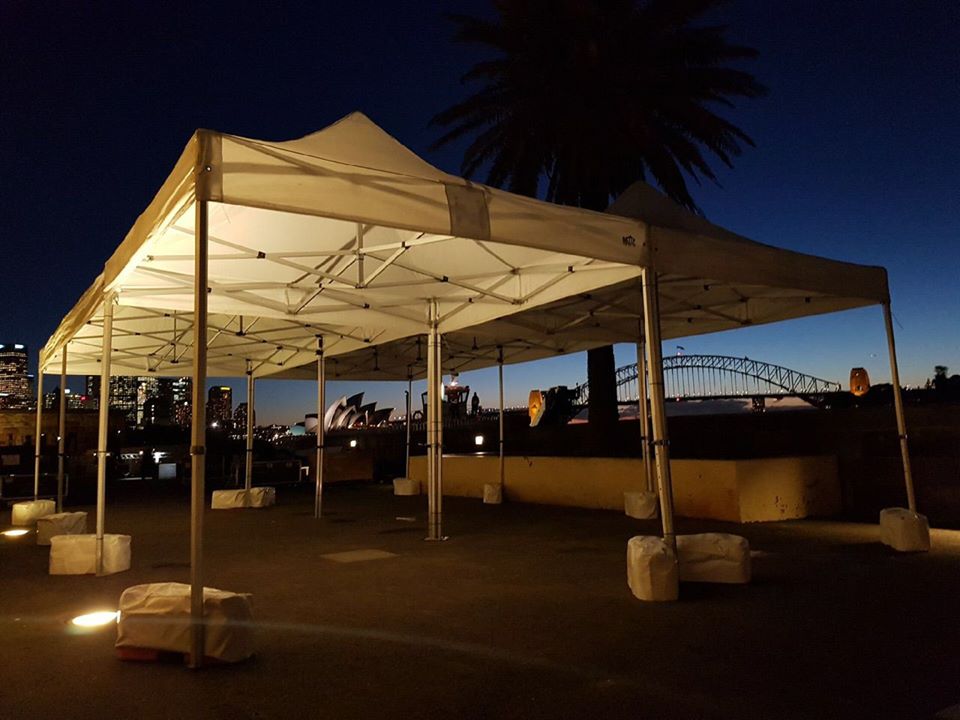 evening outdoor set up with pop marquee
