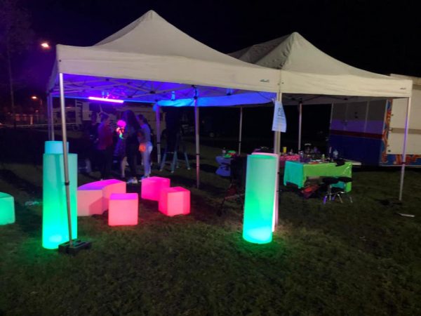 outdoor glow themed event with glow pillars and spheres