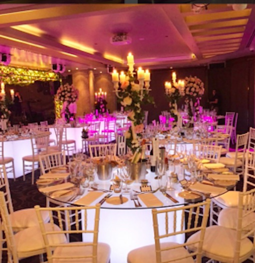 glow themed function with glow round banquet table with white tiffany chairs