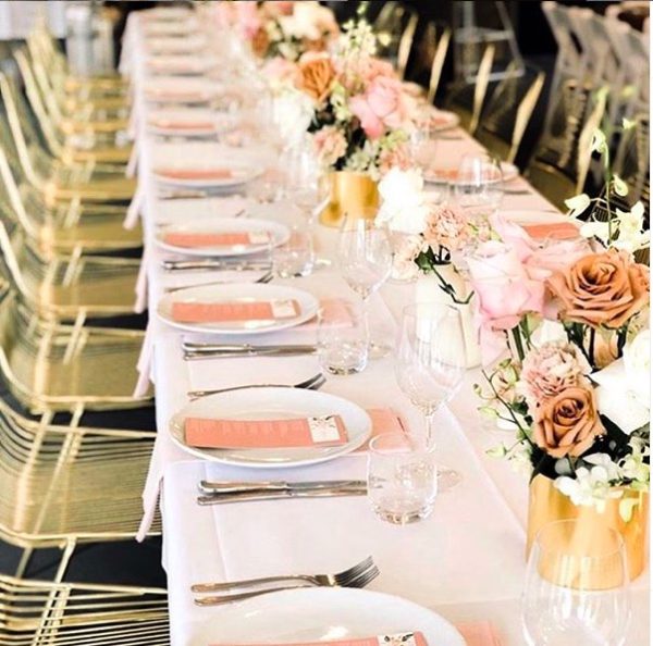 outdoor wedding reception with gold wire chairs