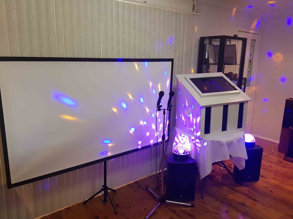home karaoke party with projector screen, karaoke and jukebox