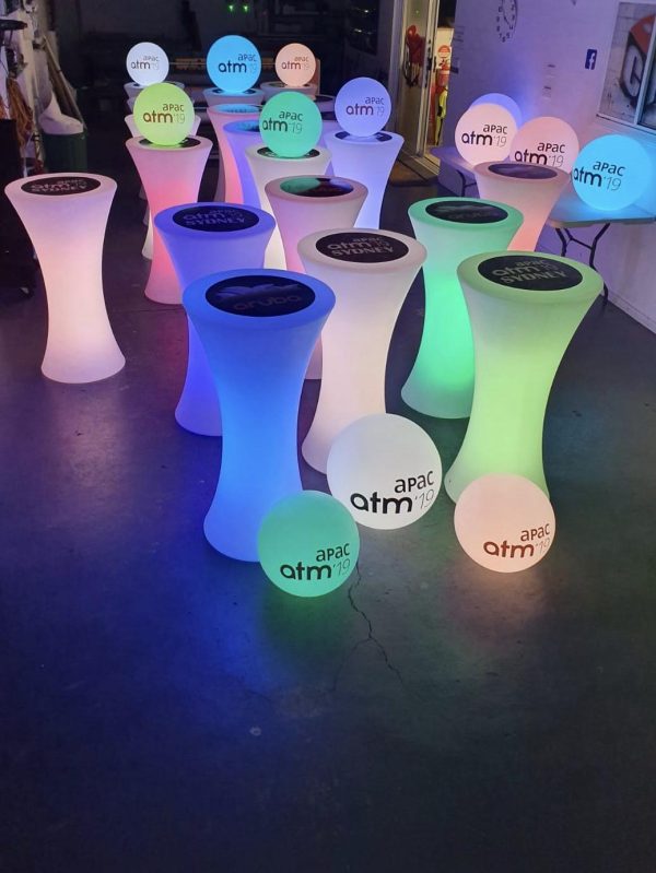 glow themed furniture with cocktail tables and spheres