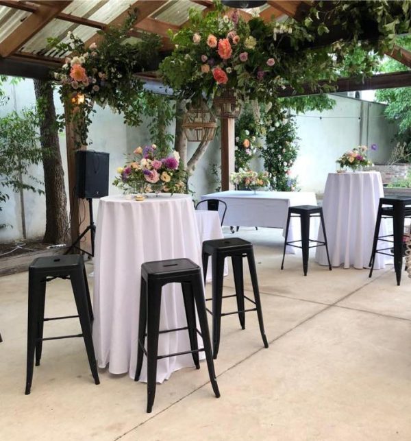 function with cocktail tables and black tolix stool set up