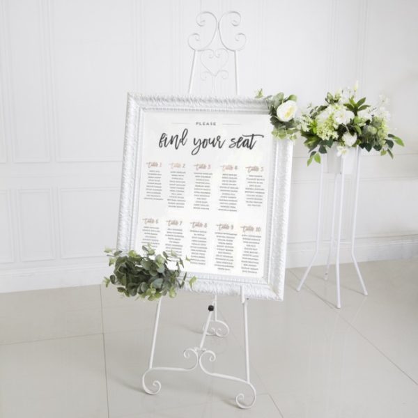 white french easel with wedding signage