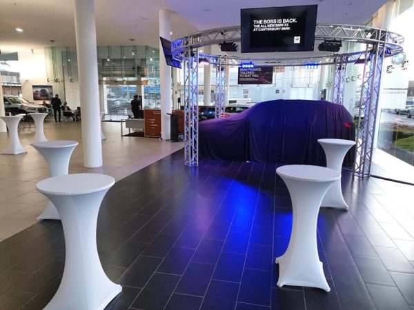 car exhibition with cocktail tables with white lycra sock