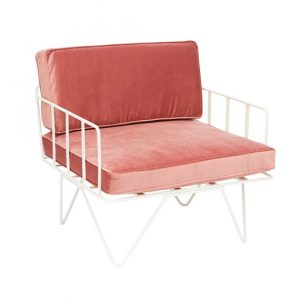 white wire arm chair with pink cushions