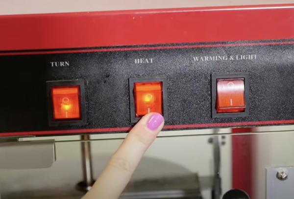 switching the turn and heat function on a popcorn machine